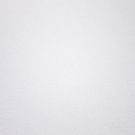 A smooth white textured background suitable for minimalistic design projects.
